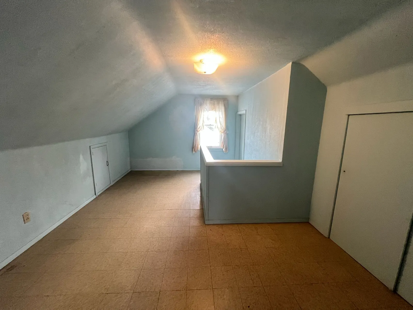 Attic bedroom at 5942 N 38th St, Milwaukee, before renovation